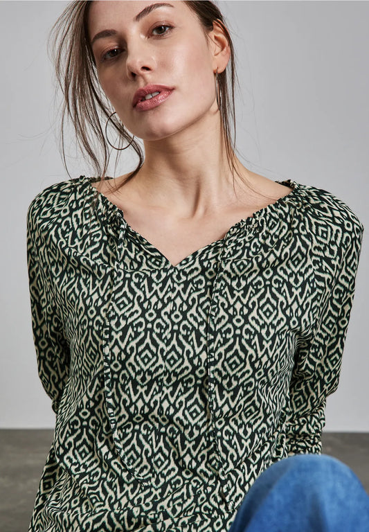 Mönstrad raglan blus
