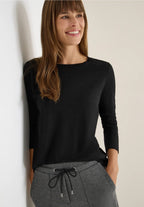 Glittrig jerseytröja