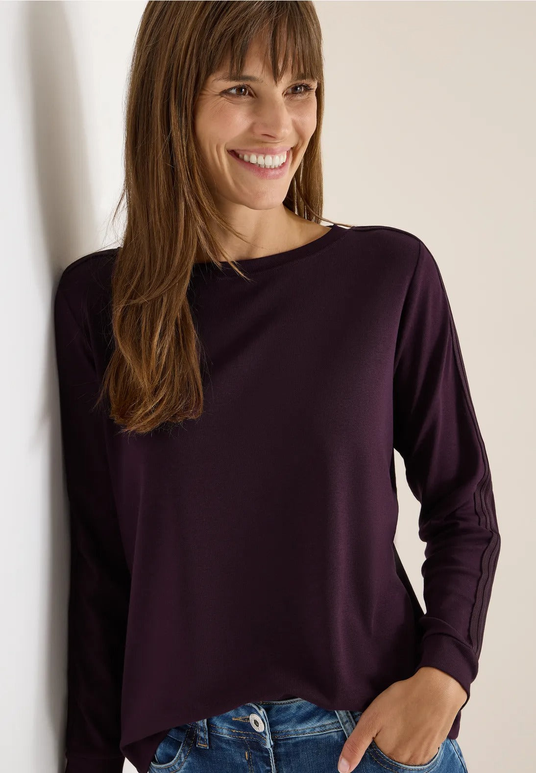 Tröja med dekorativ detalj på ärm