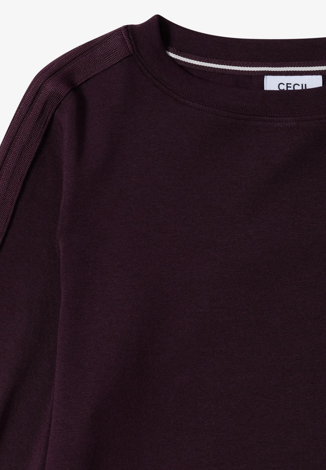 Tröja med dekorativ detalj på ärm