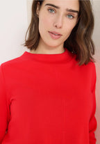 Enfärgad tröja med trattkrage, pumpa röd