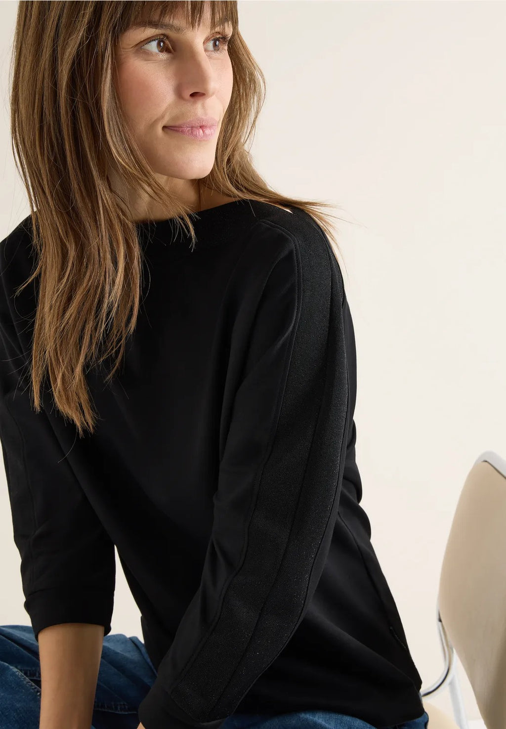 Tröja med skimrade band på ärmen