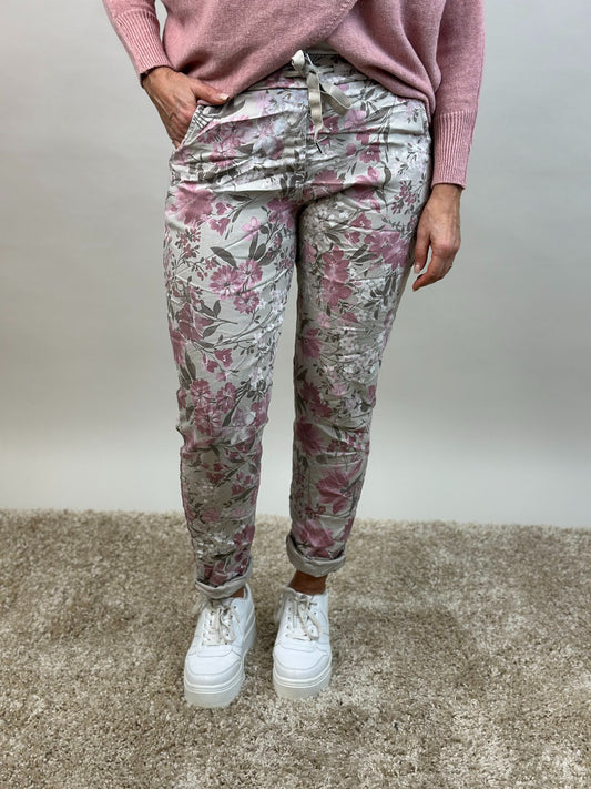 Magiskt stretchiga byxor med resår i midjan rosa mönstrade