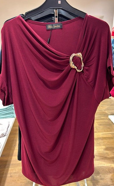 Draperad topp med gulddetalj , bordo